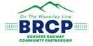 A green and blue logo depicting the Eildon Hills and the Borders Railway line